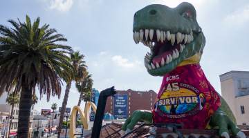 Ripley's Dino rocking the Survivor buff at Ripley’s Believe It or Not! in Hollywood.