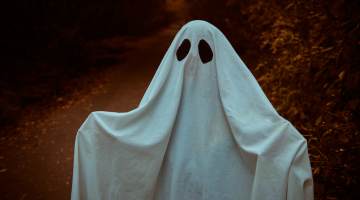 Child in ghost costume